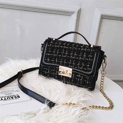 A chain goes with a messenger bag