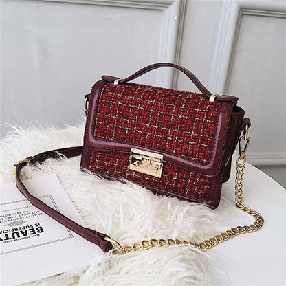 A chain goes with a messenger bag